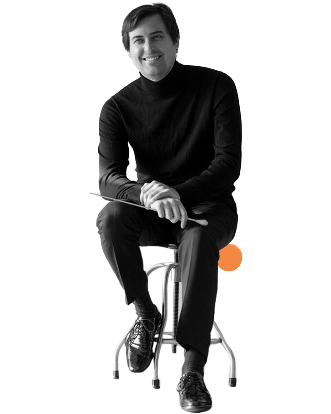 Michael Repper seated on a chair